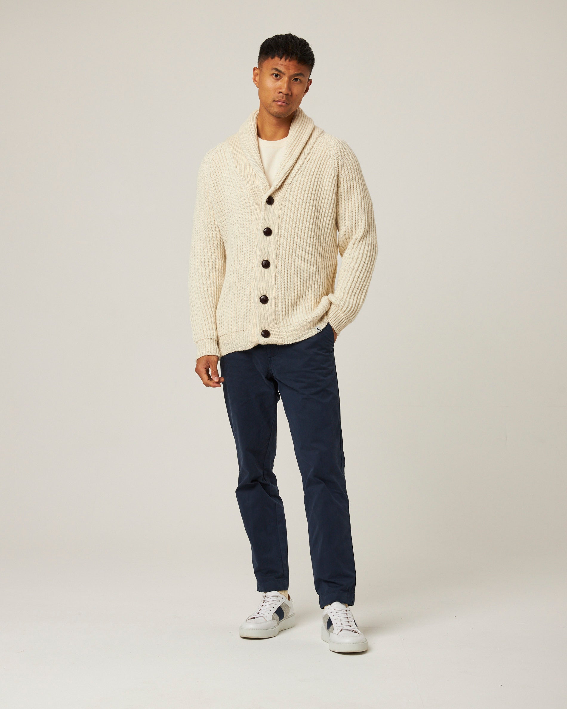 Image of model wearing Wilkinson Cardigan. Model is 6ft1in, chest size 38in and wearing size Large
