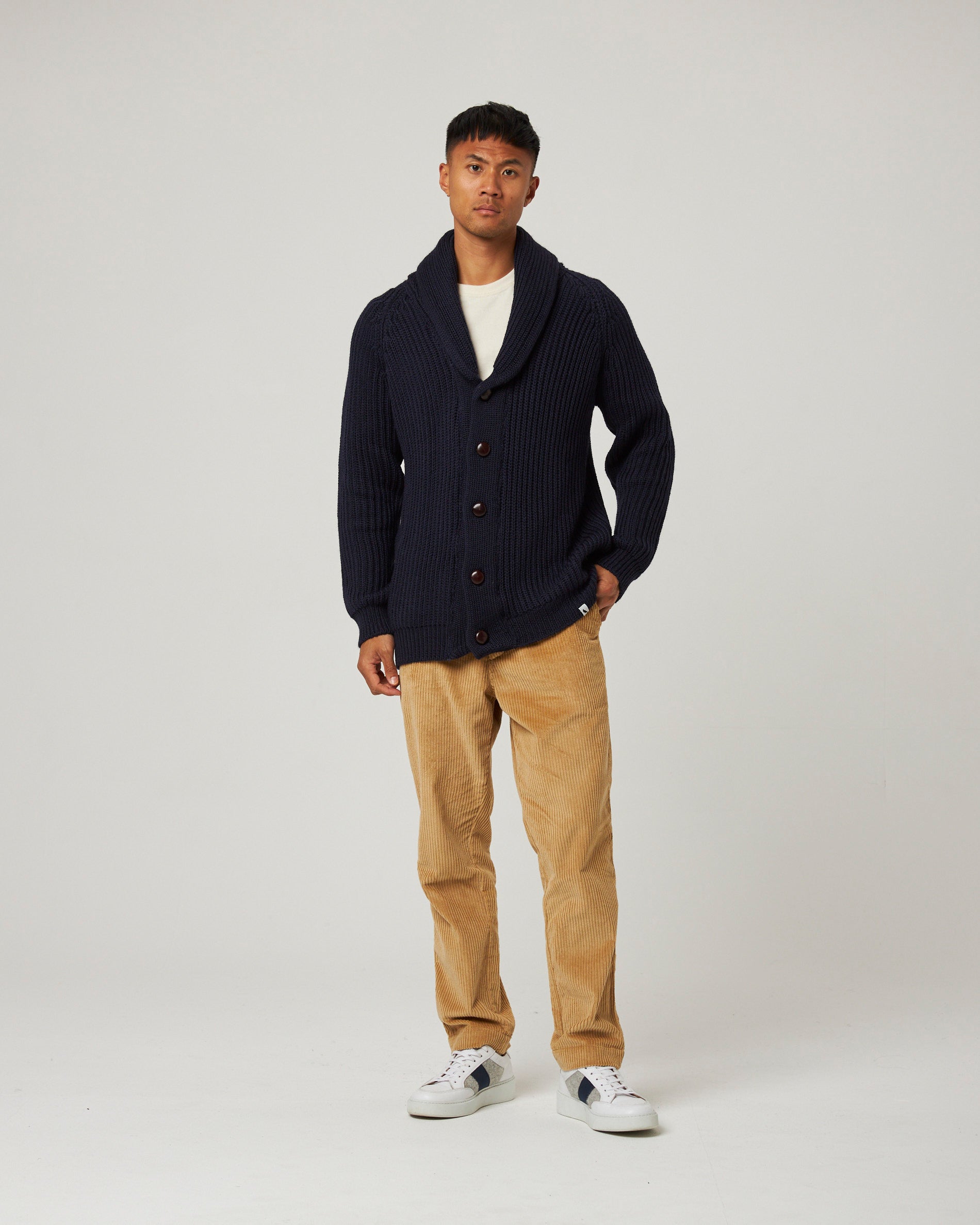 Image of model wearing Wilkinson Cardigan. Model is 6ft1in, chest size 38in and wearing size Large