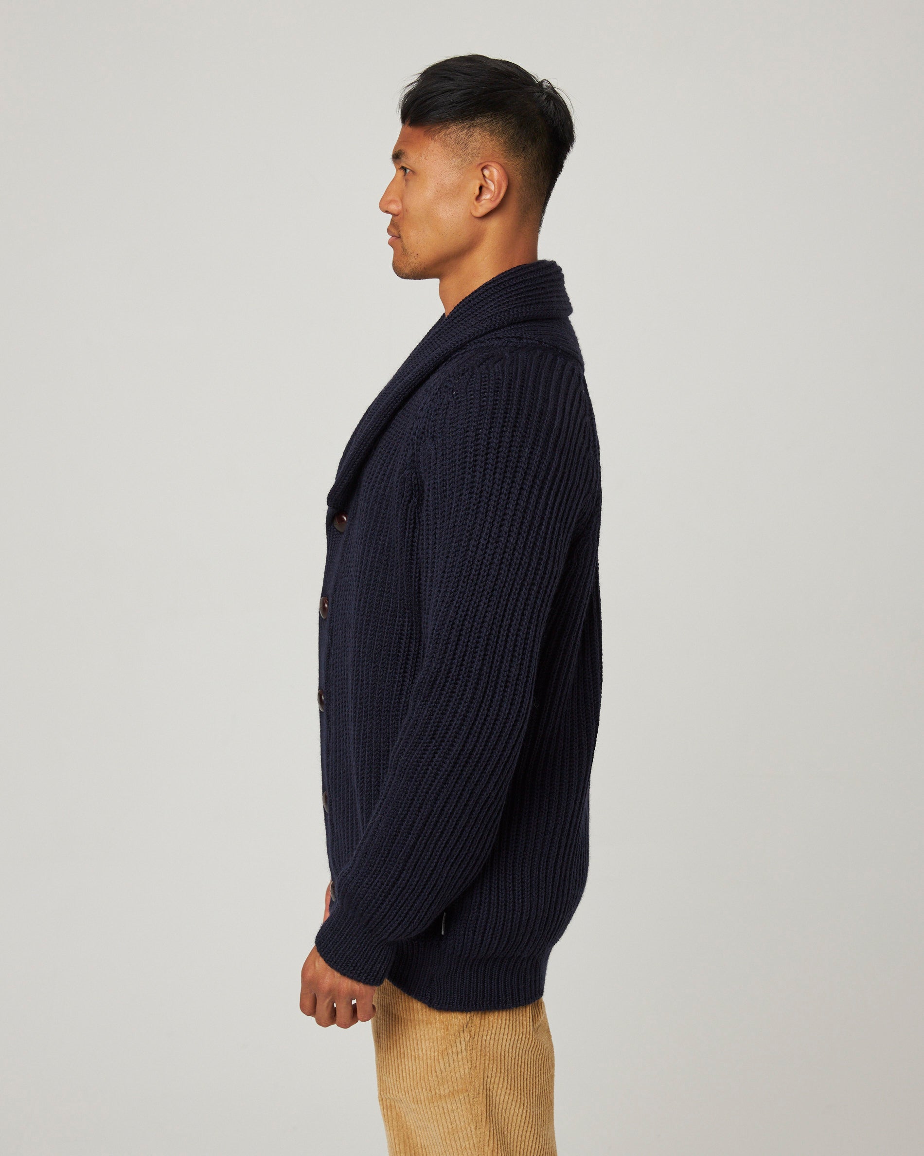 Image of model wearing Wilkinson Cardigan. Model is 6ft1in, chest size 38in and wearing size Large