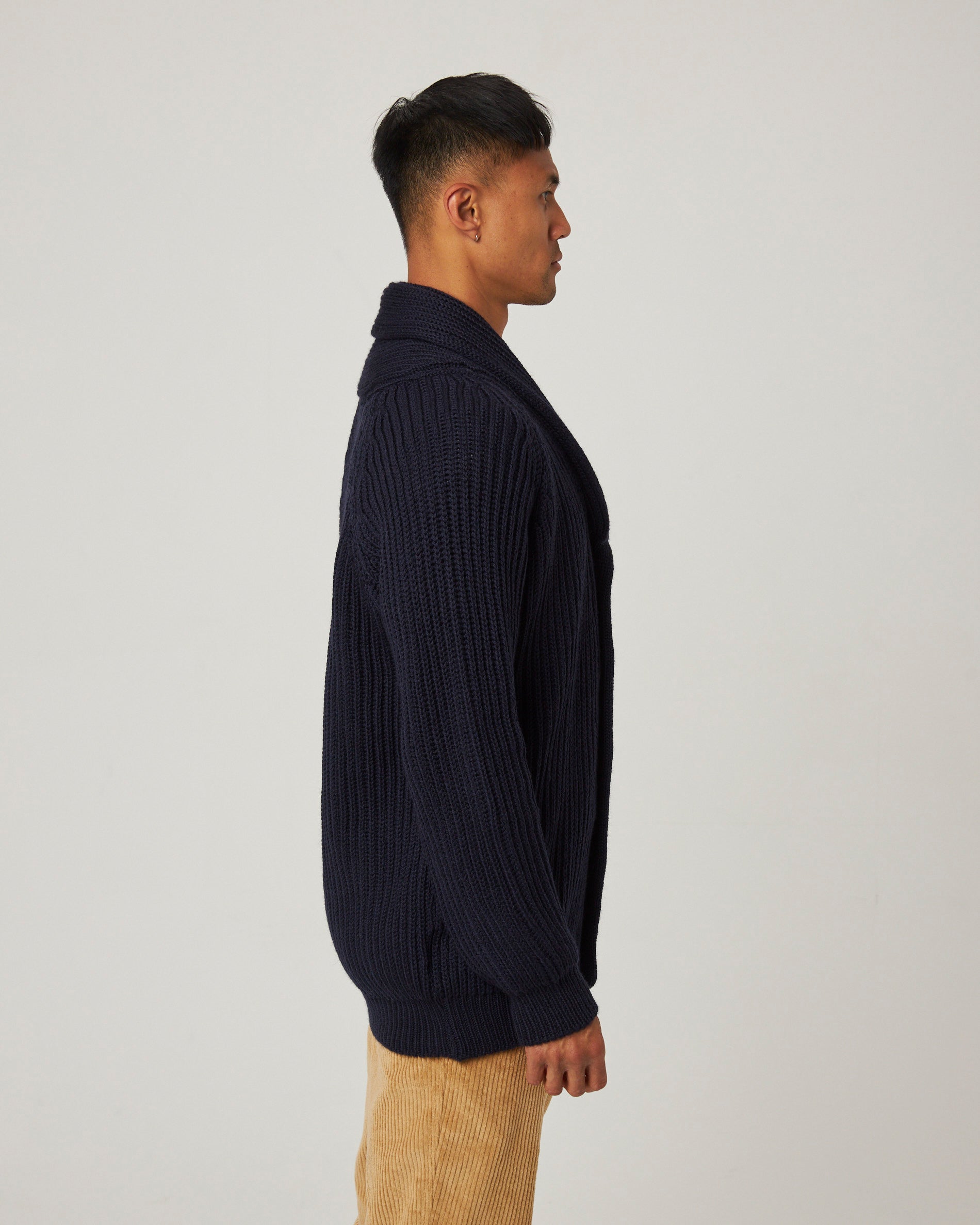 Image of model wearing Wilkinson Cardigan. Model is 6ft1in, chest size 38in and wearing size Large