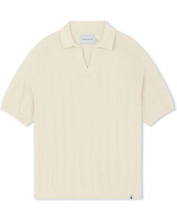 Image of model wearing Alma Polo shirt. 