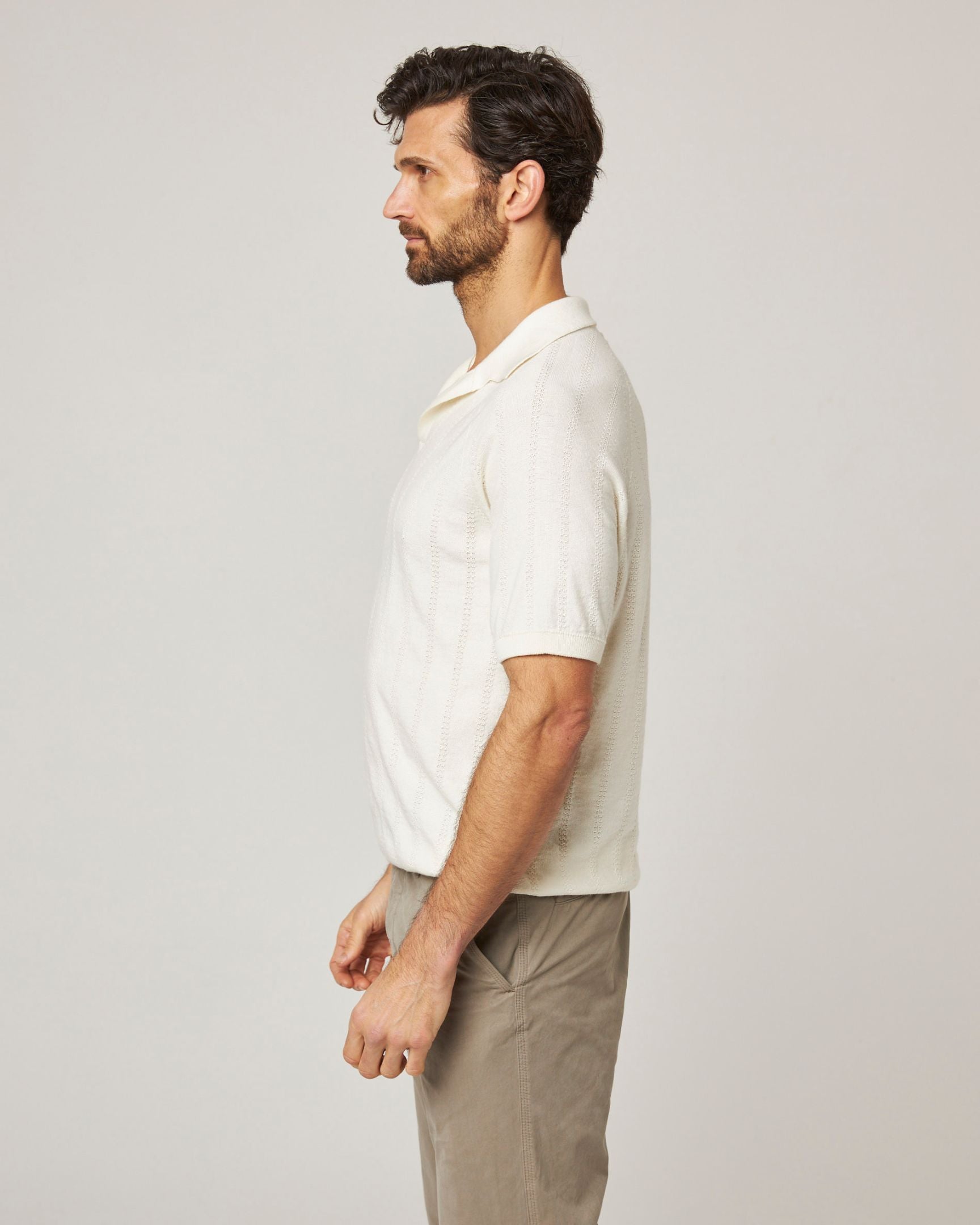 Image of model wearing Alma Polo shirt. 