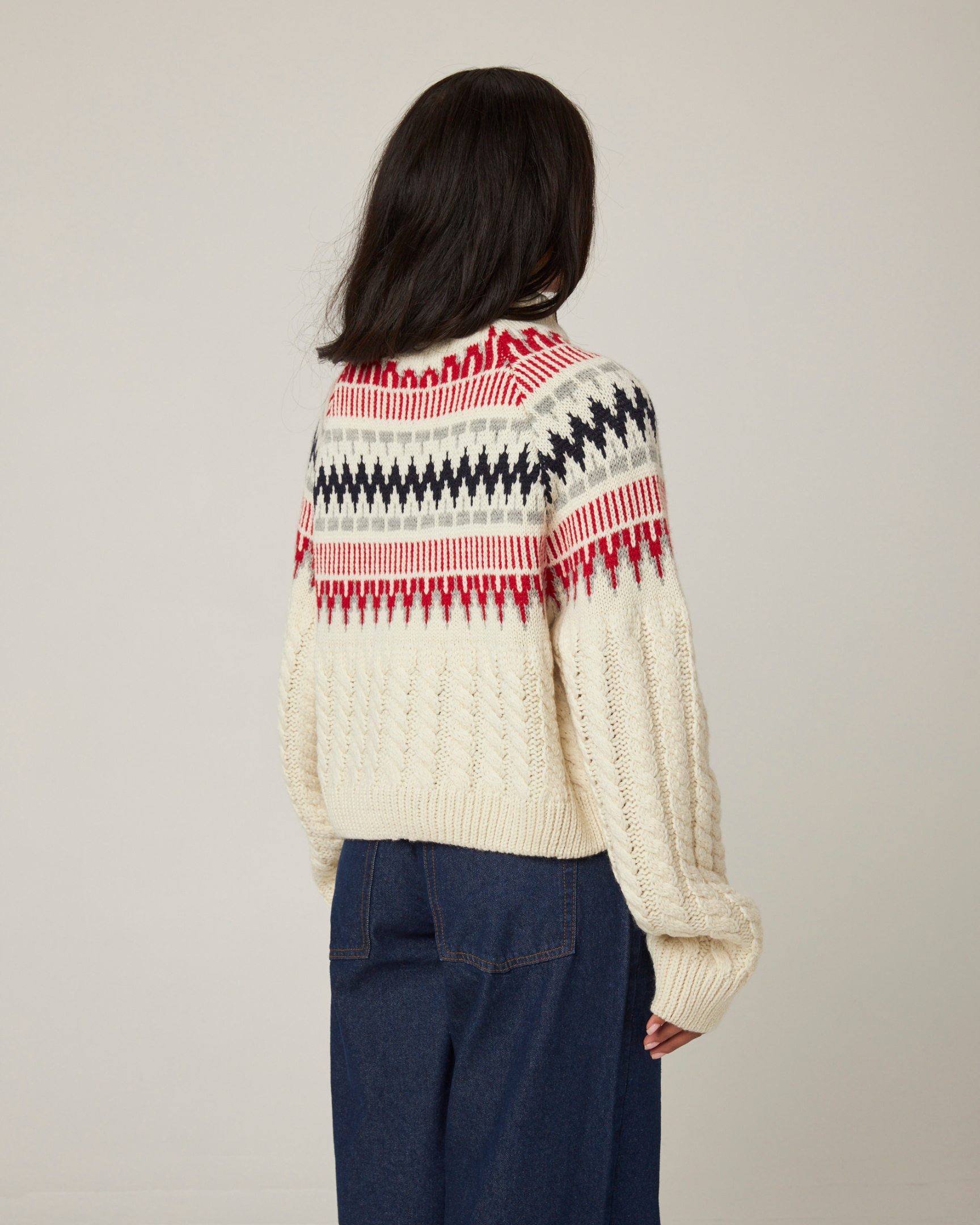 Image of model wearing Alpine Chalet Sweater. Model is 5ft8in, size UK 8 and wearing size Small