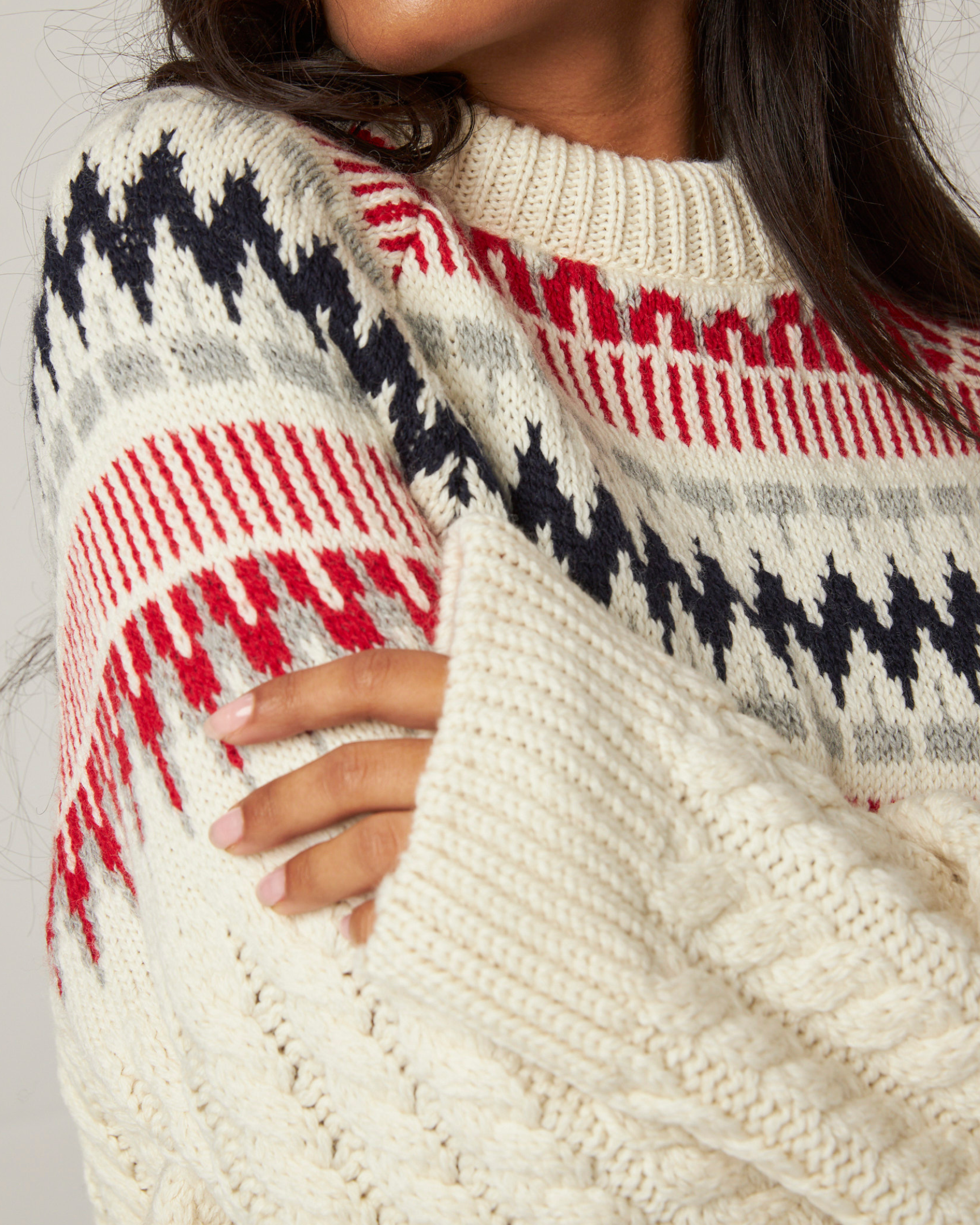 Image of model wearing Alpine Chalet Sweater. Model is 5ft8in, size UK 8 and wearing size Small