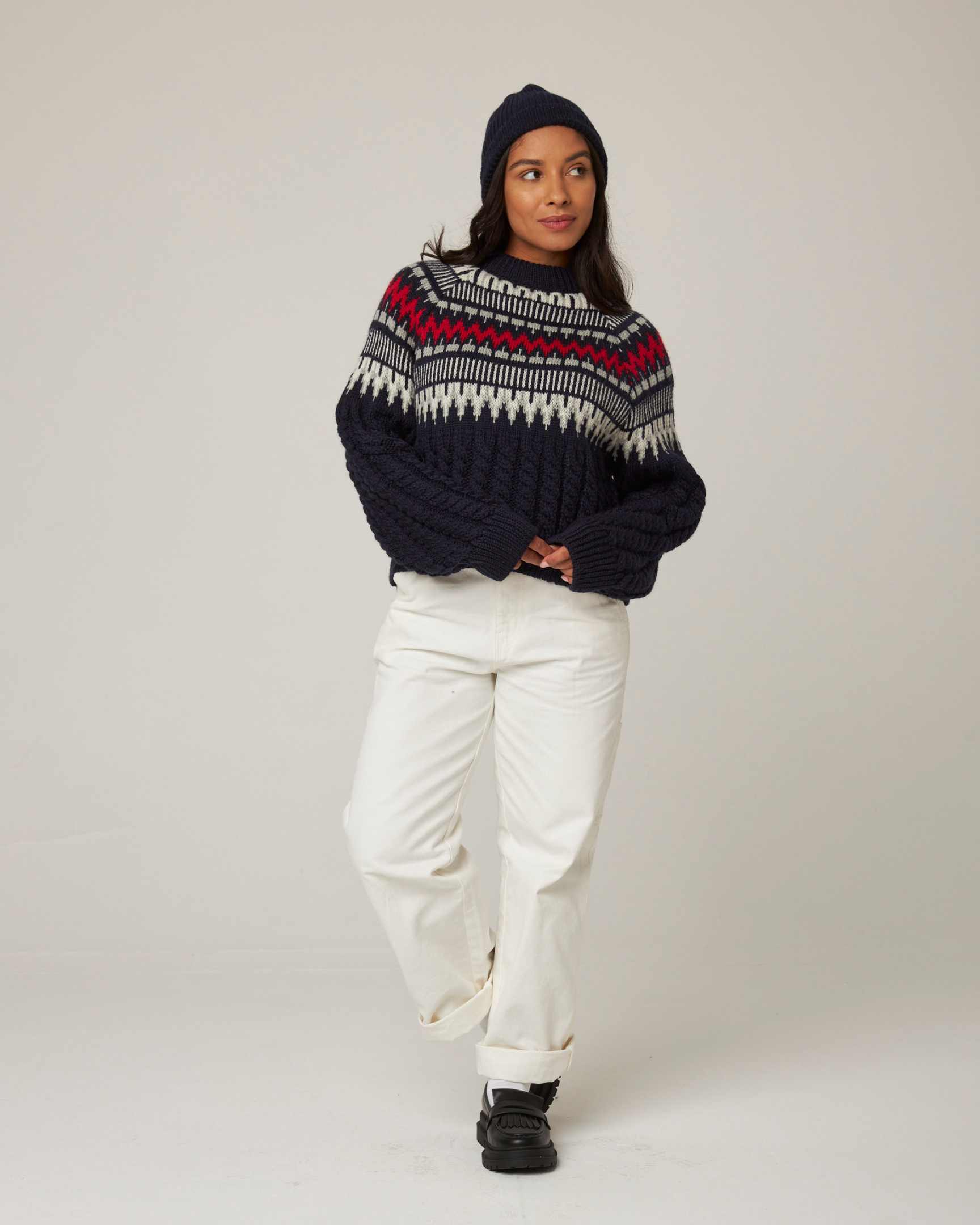 Image of model wearing Alpine Chalet Sweater. 