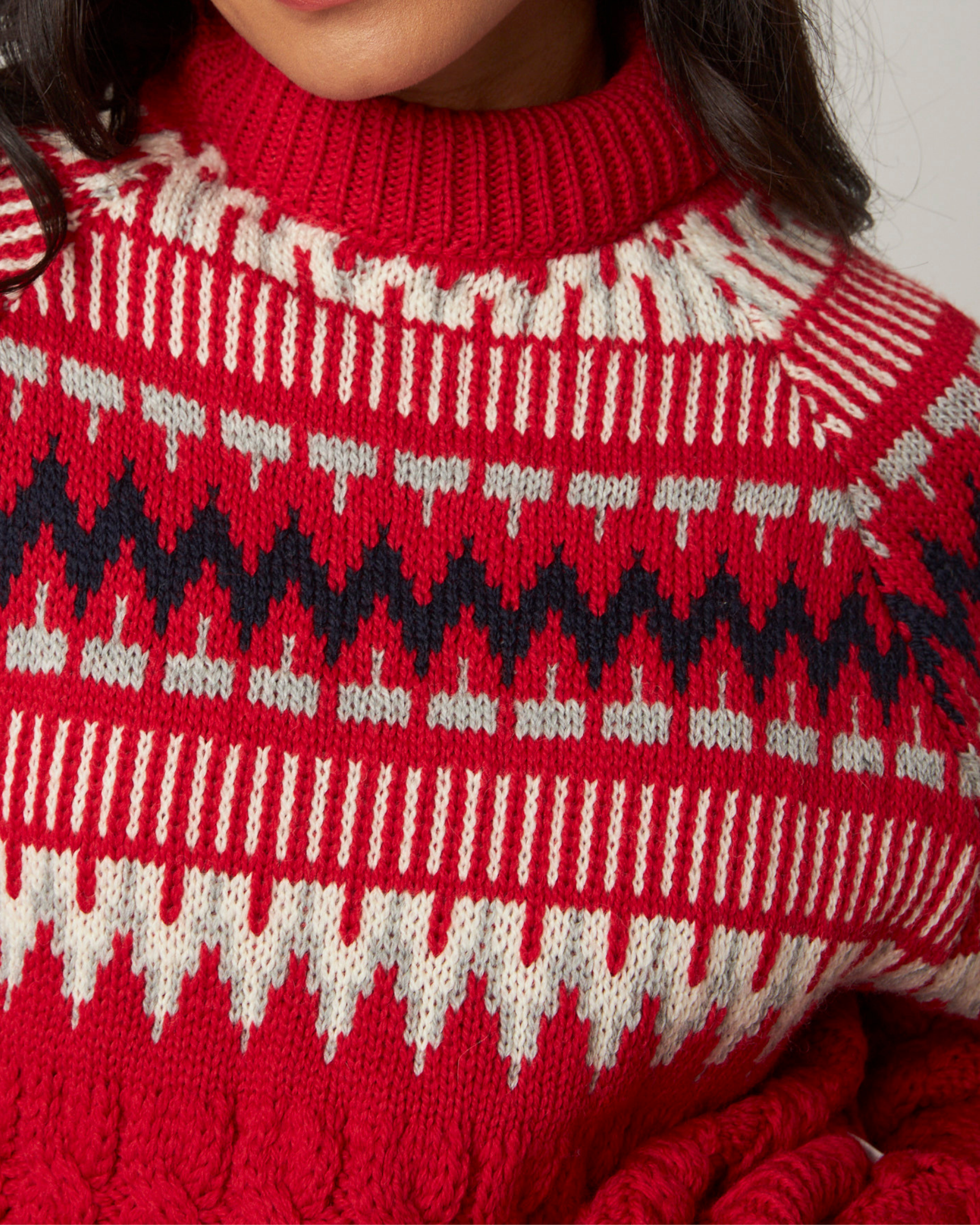 Image of model wearing Alpine Chalet Sweater. Model is 5ft8in, size UK 8 and wearing size Small