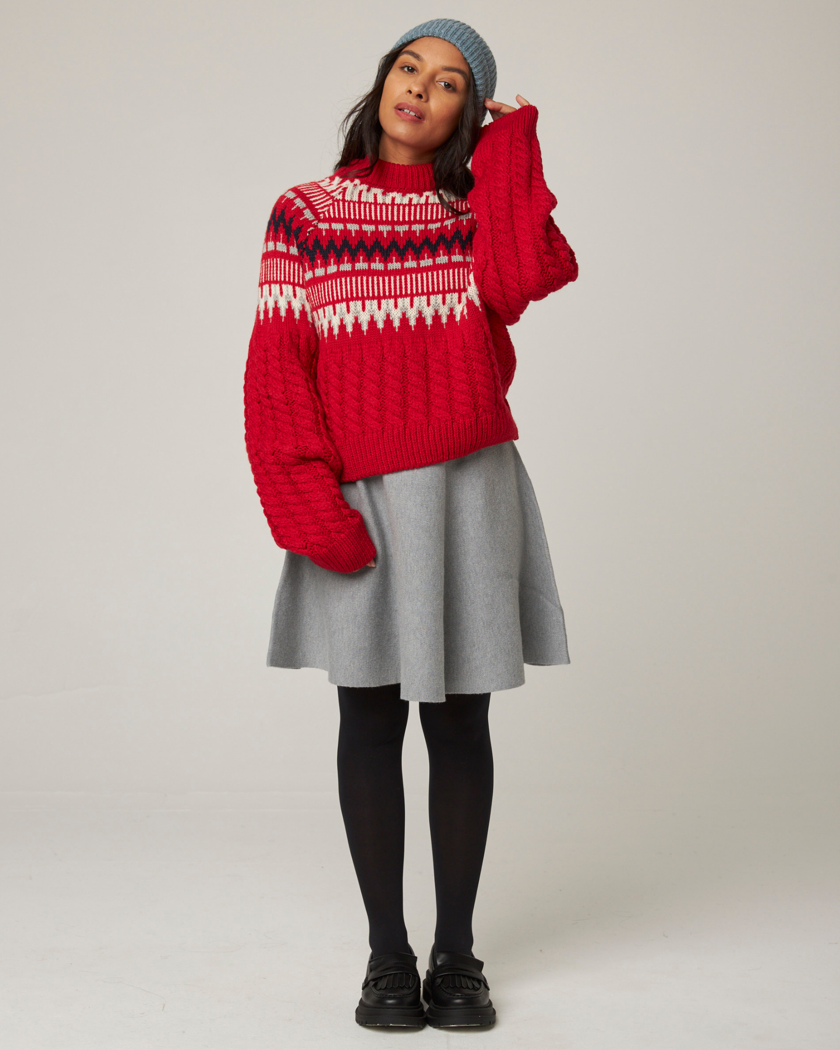 Image of model wearing Alpine Chalet Sweater. Model is 5ft8in, size UK 8 and wearing size Small