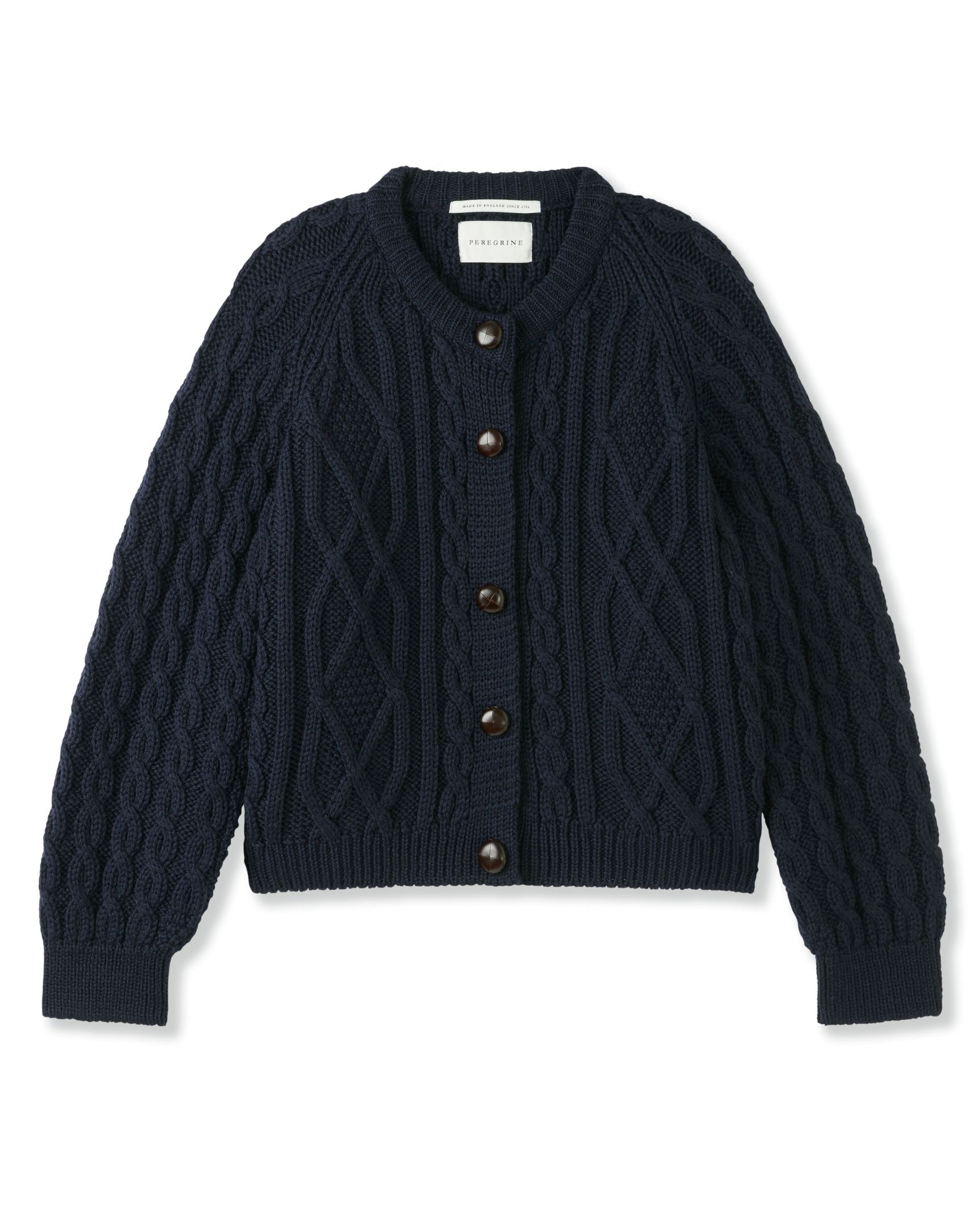 Image of model wearing Beckett Cable Knit Cardigan. 