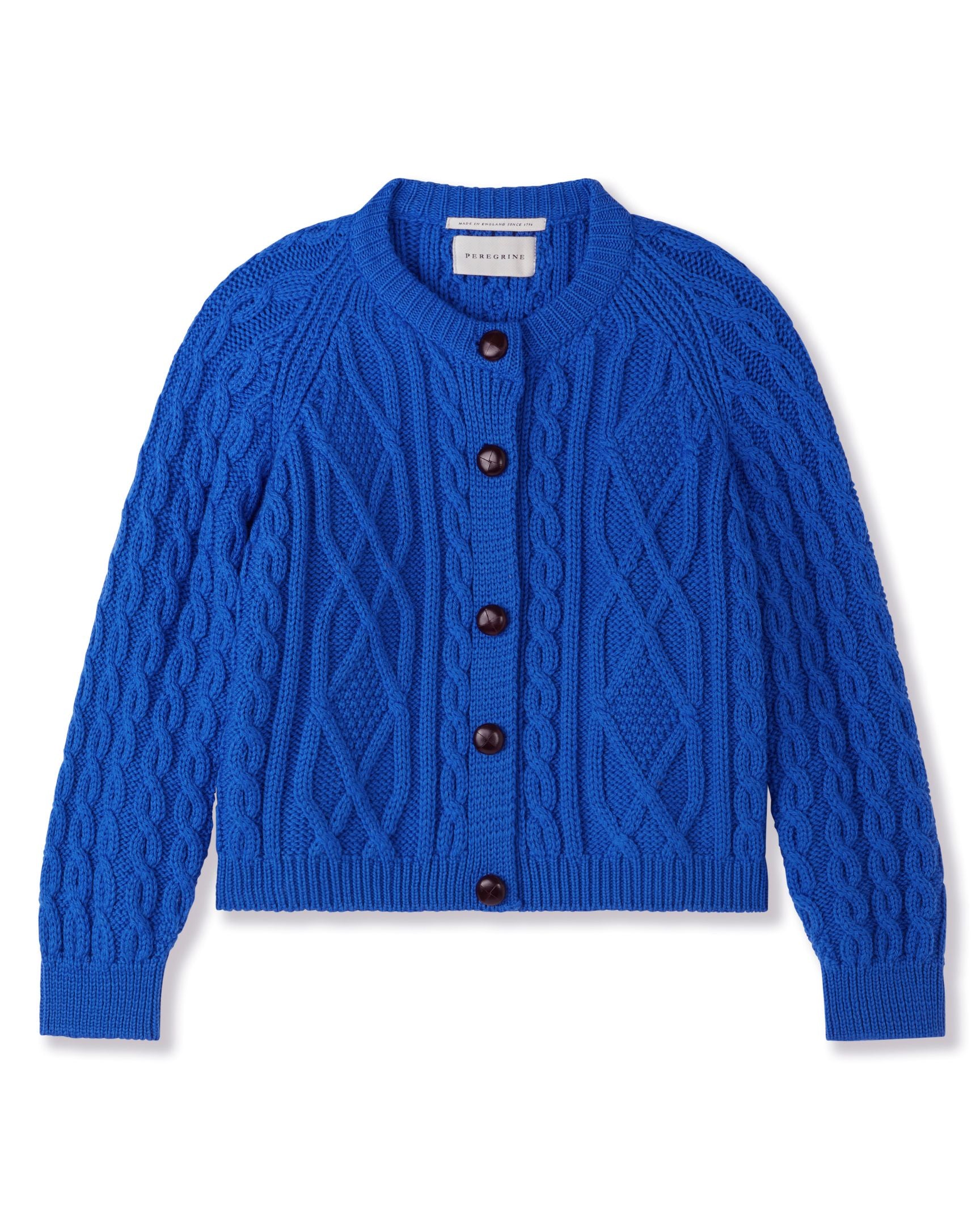 Image of model wearing Beckett Cable Knit Cardigan. 