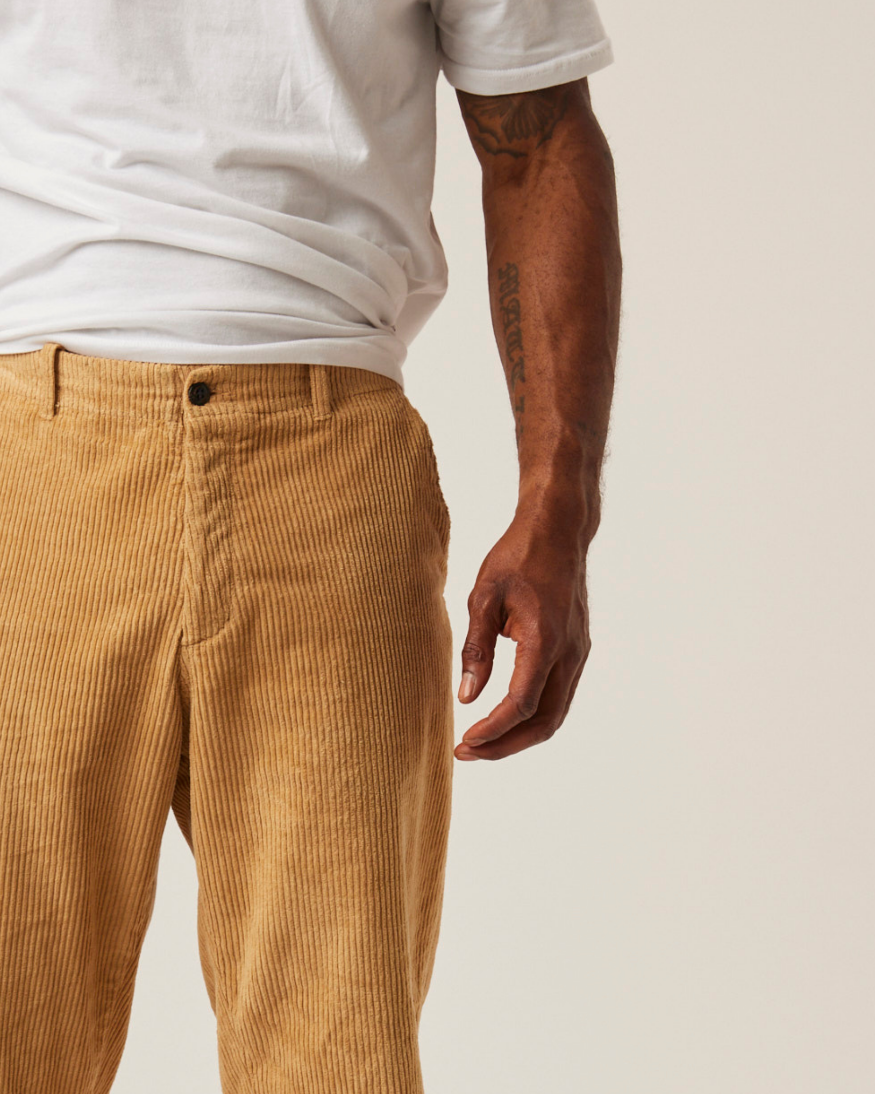 Image of model wearing Blake Corduroy Trousers. 