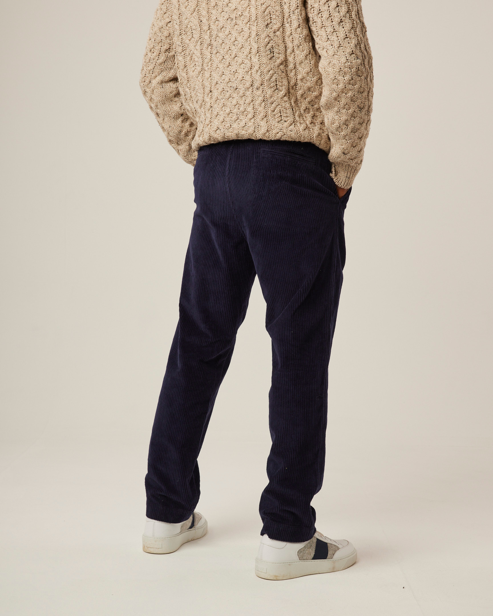 Image of model wearing Blake Corduroy Trousers. 