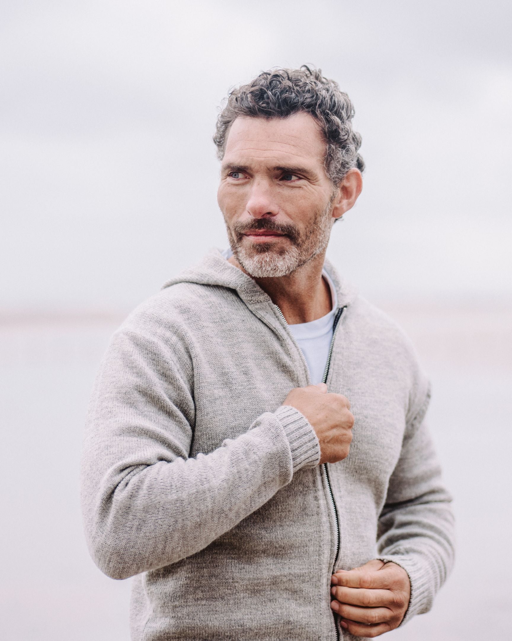 Image of model wearing Brompton Knitted Hoodie. 