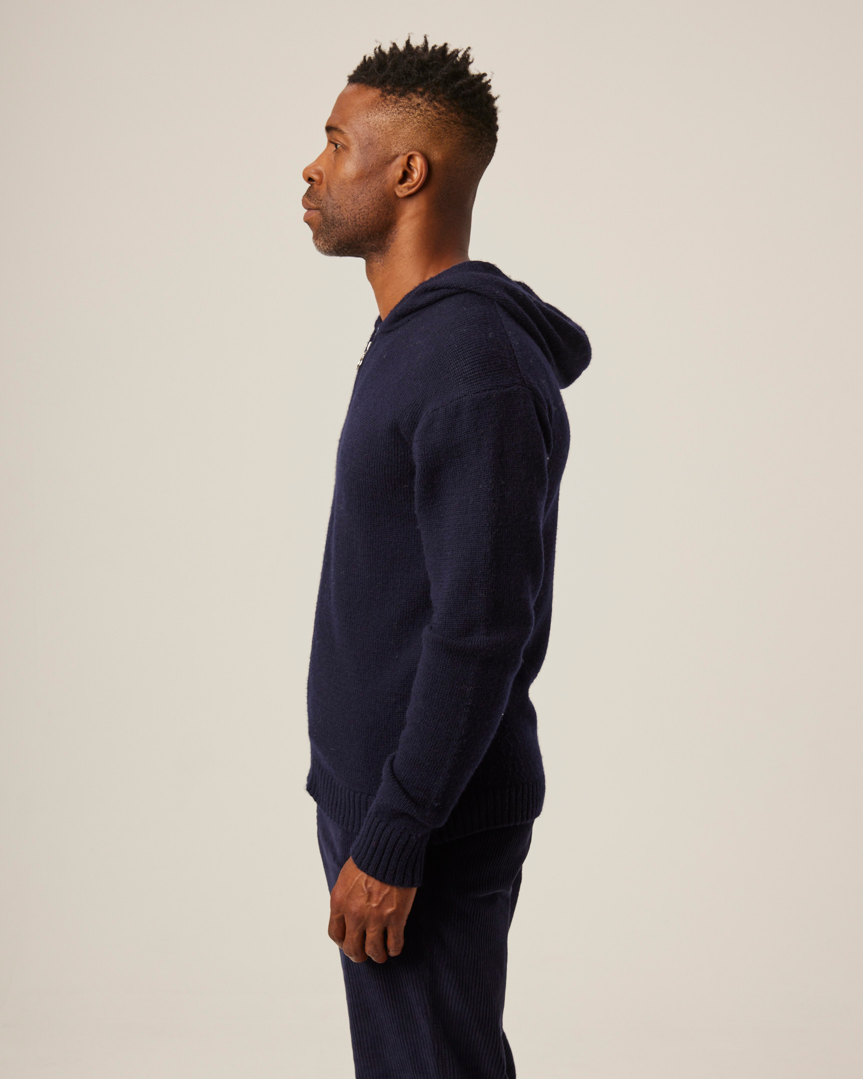 Image of model wearing Brompton Knitted Hoodie. 
