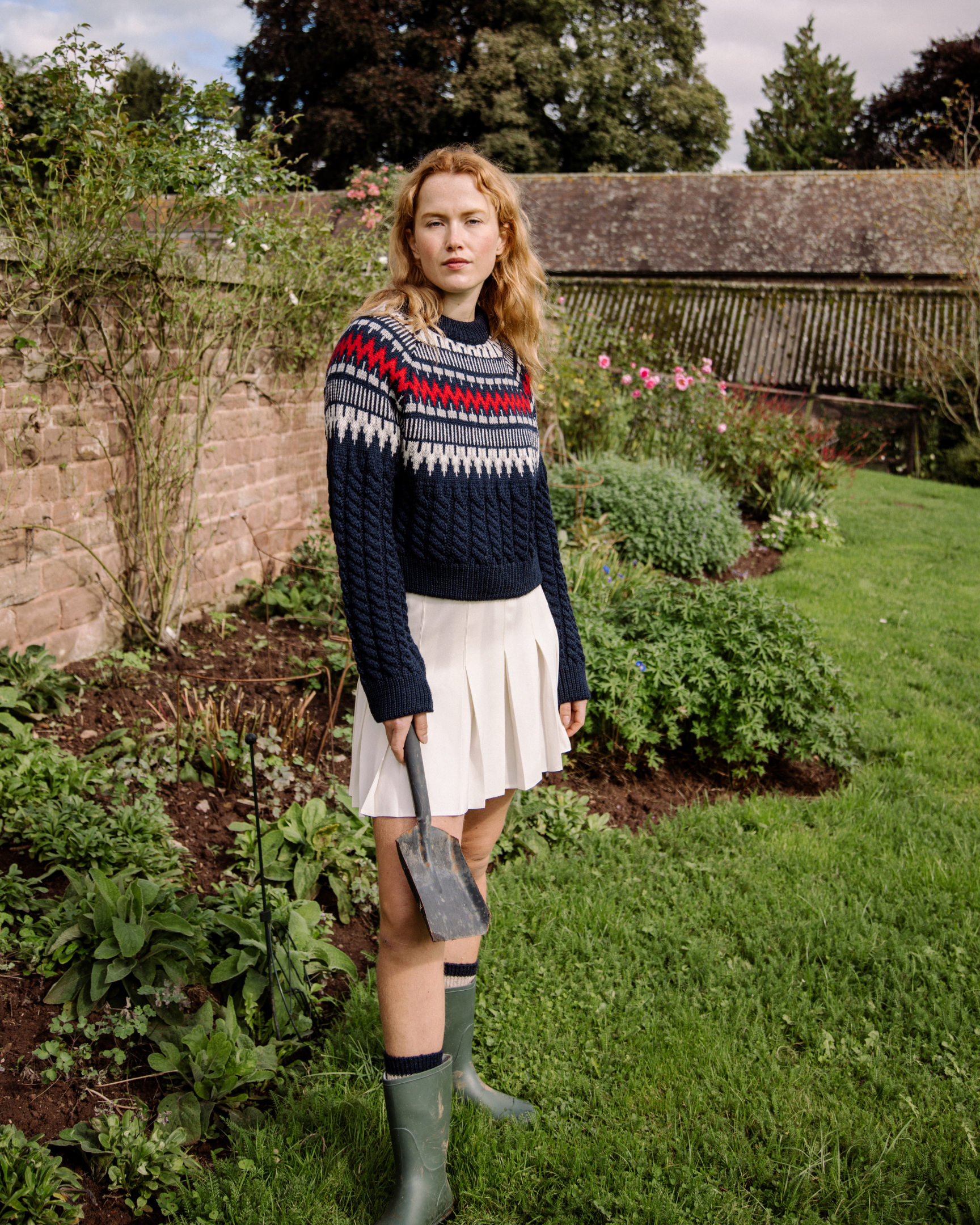 Image of model wearing Alpine Chalet Sweater. 