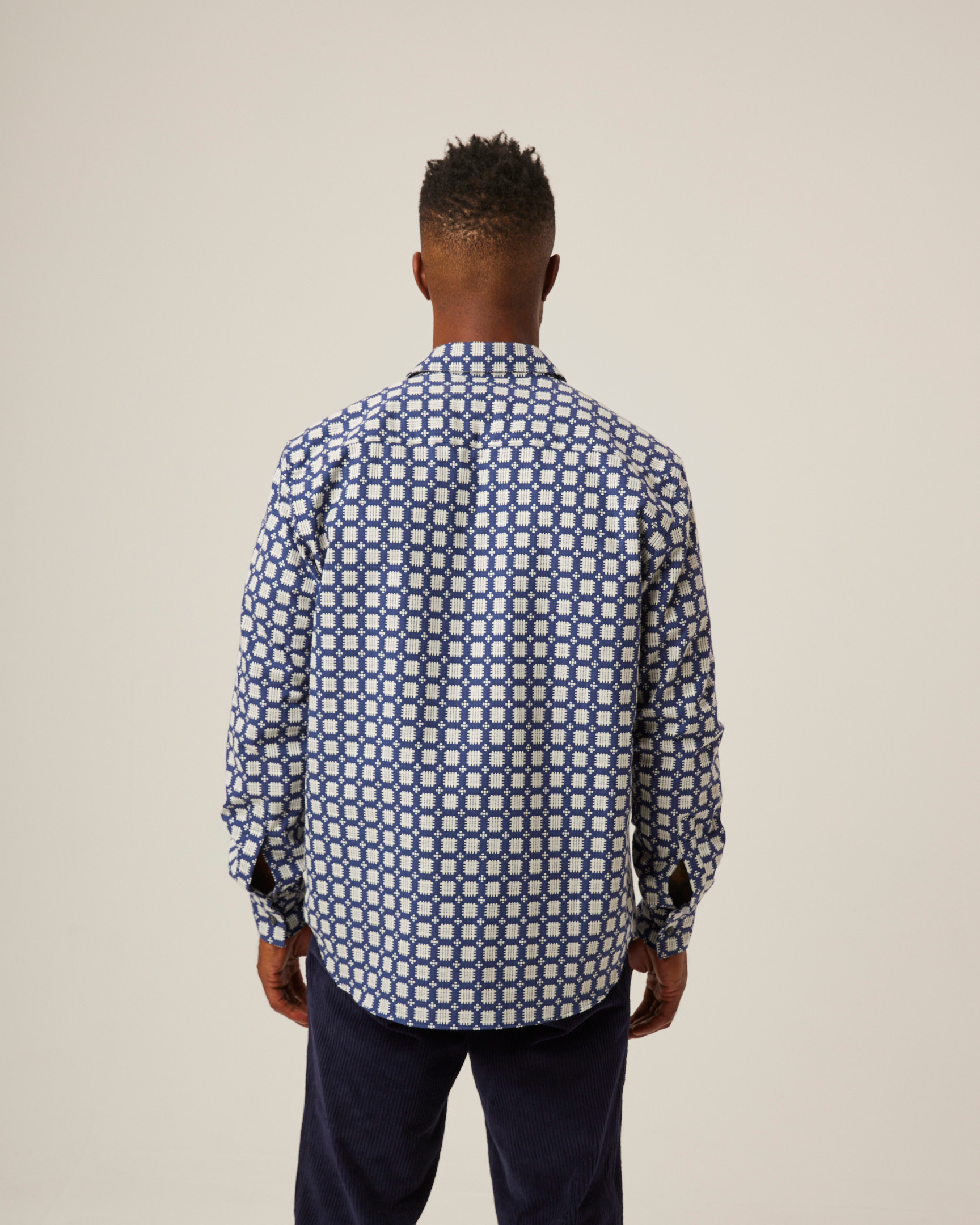 Image of model wearing Club Shirt. 