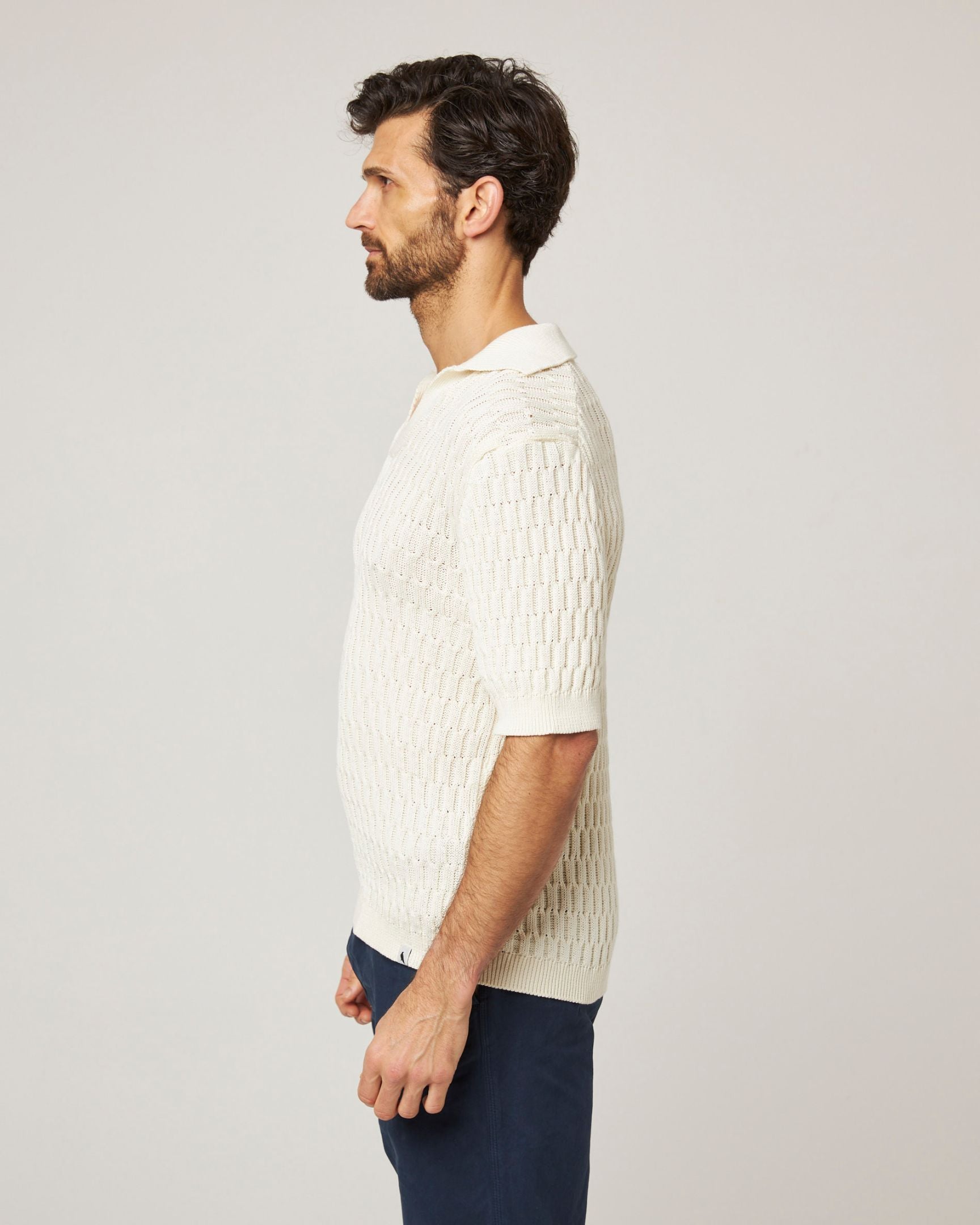 Image of model wearing Cove Polo Shirt. 