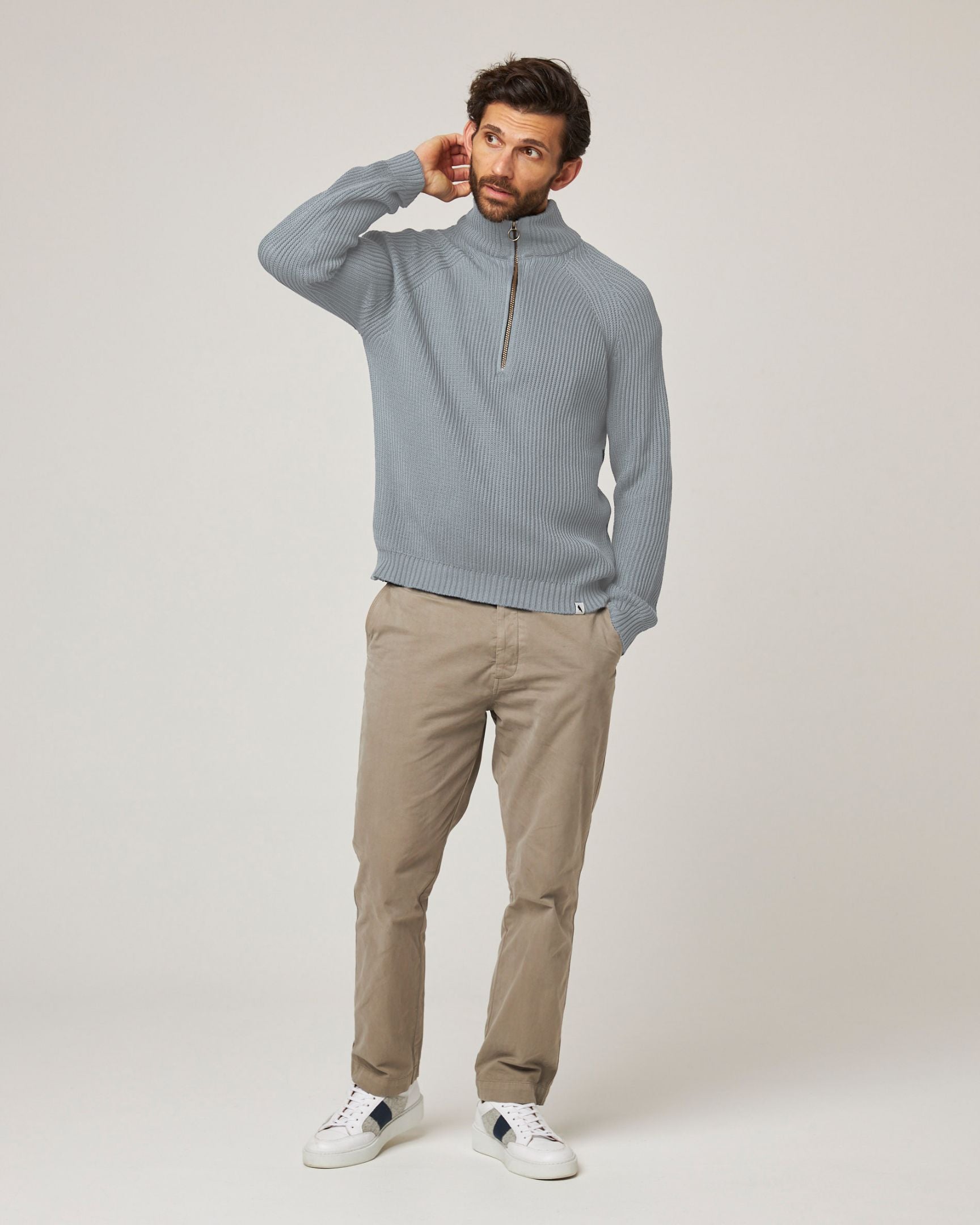 Image of model wearing Felix Quarter Zip Jumper. 