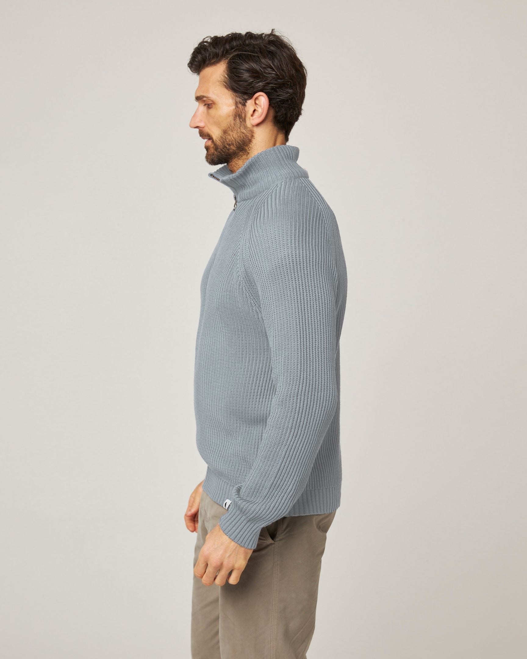Image of model wearing Felix Quarter Zip Jumper. 