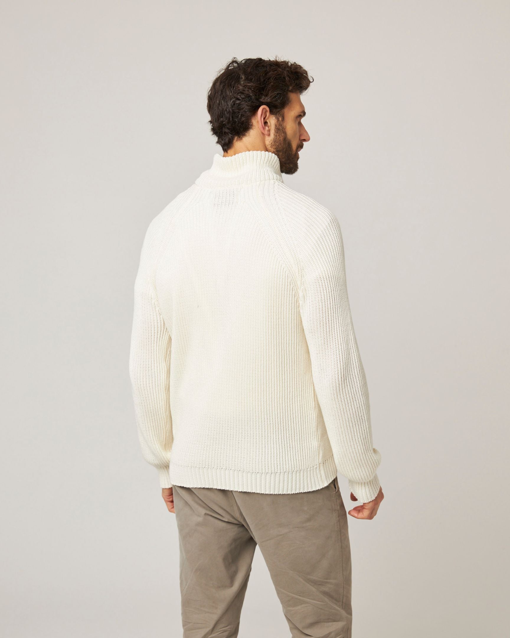 Image of model wearing Felix Quarter Zip Jumper. 