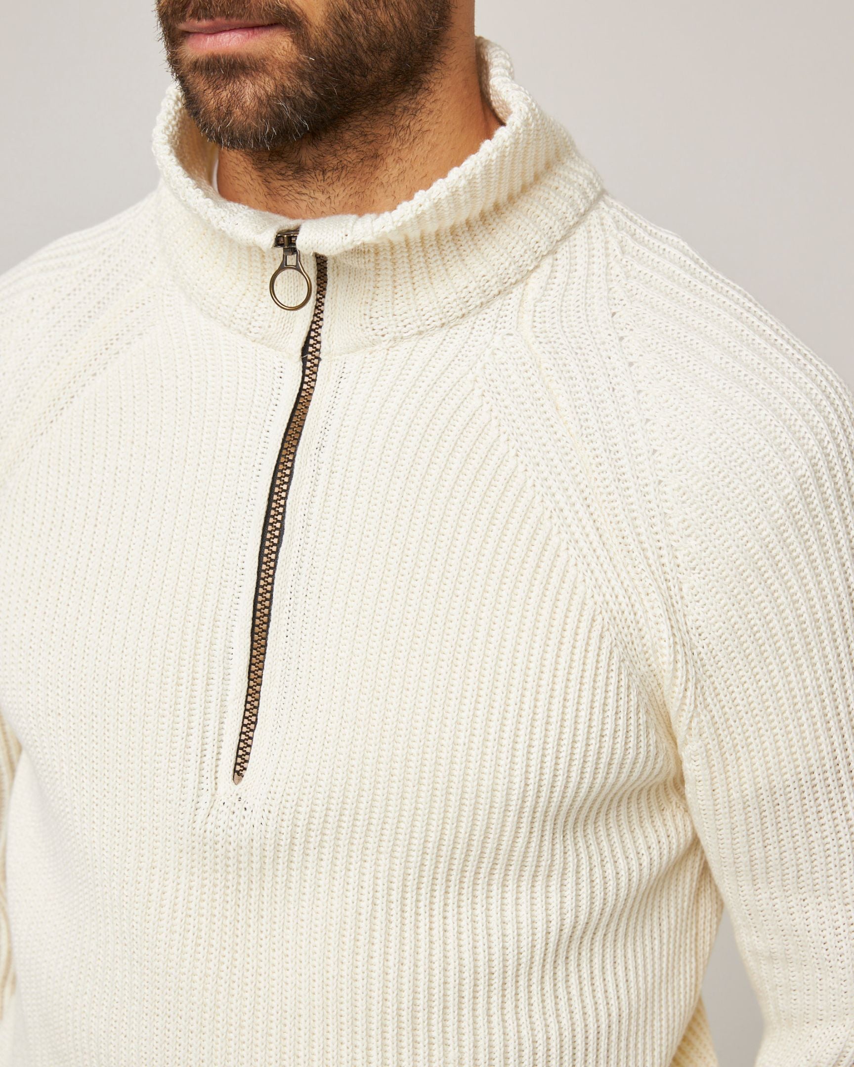 Image of model wearing Felix Quarter Zip Jumper. 