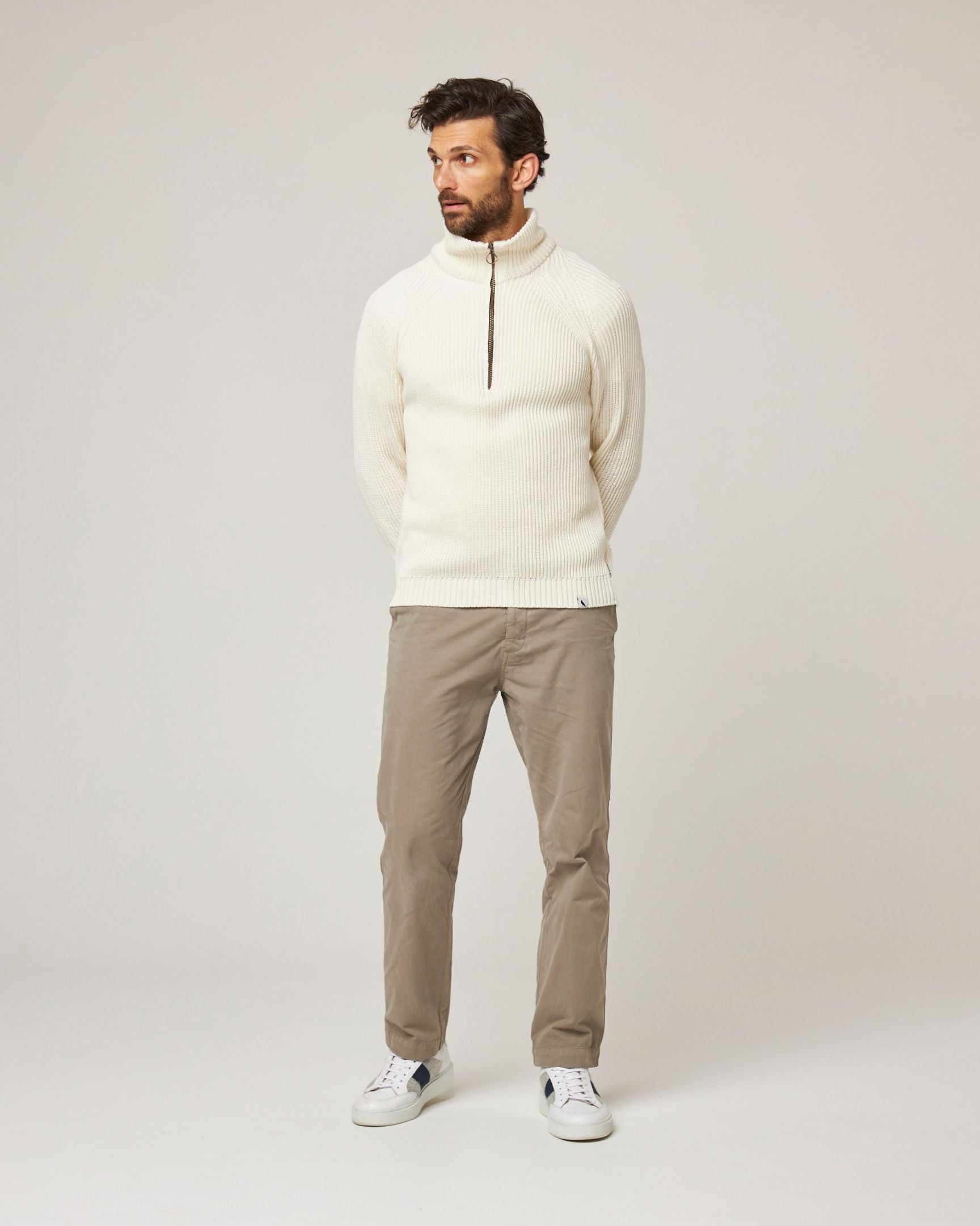 Image of model wearing Felix Quarter Zip Jumper. 