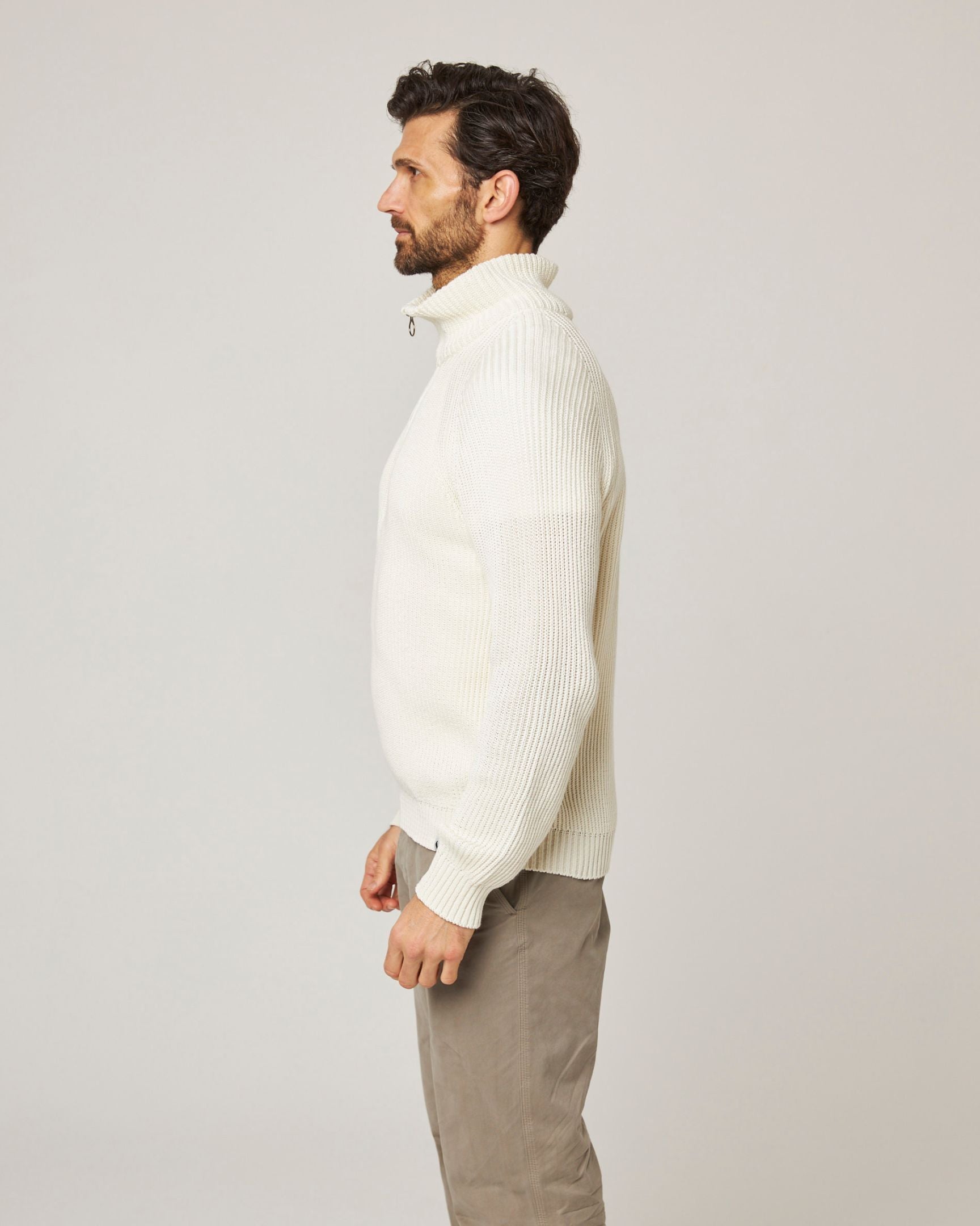 Image of model wearing Felix Quarter Zip Jumper. 