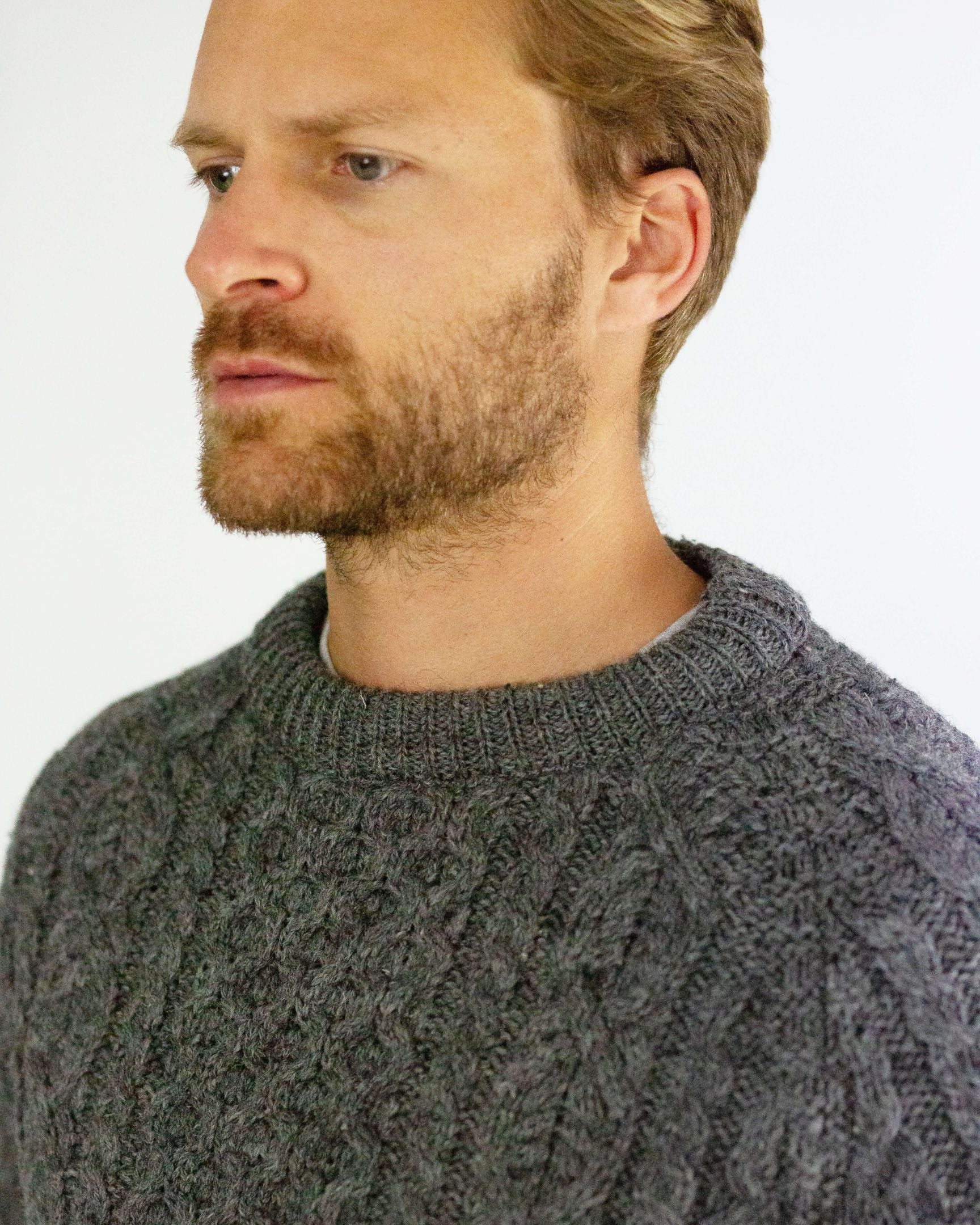 Image of model wearing Hudson Aran Jumper. Model is 6ft1in, chest size 38in and wearing size Medium