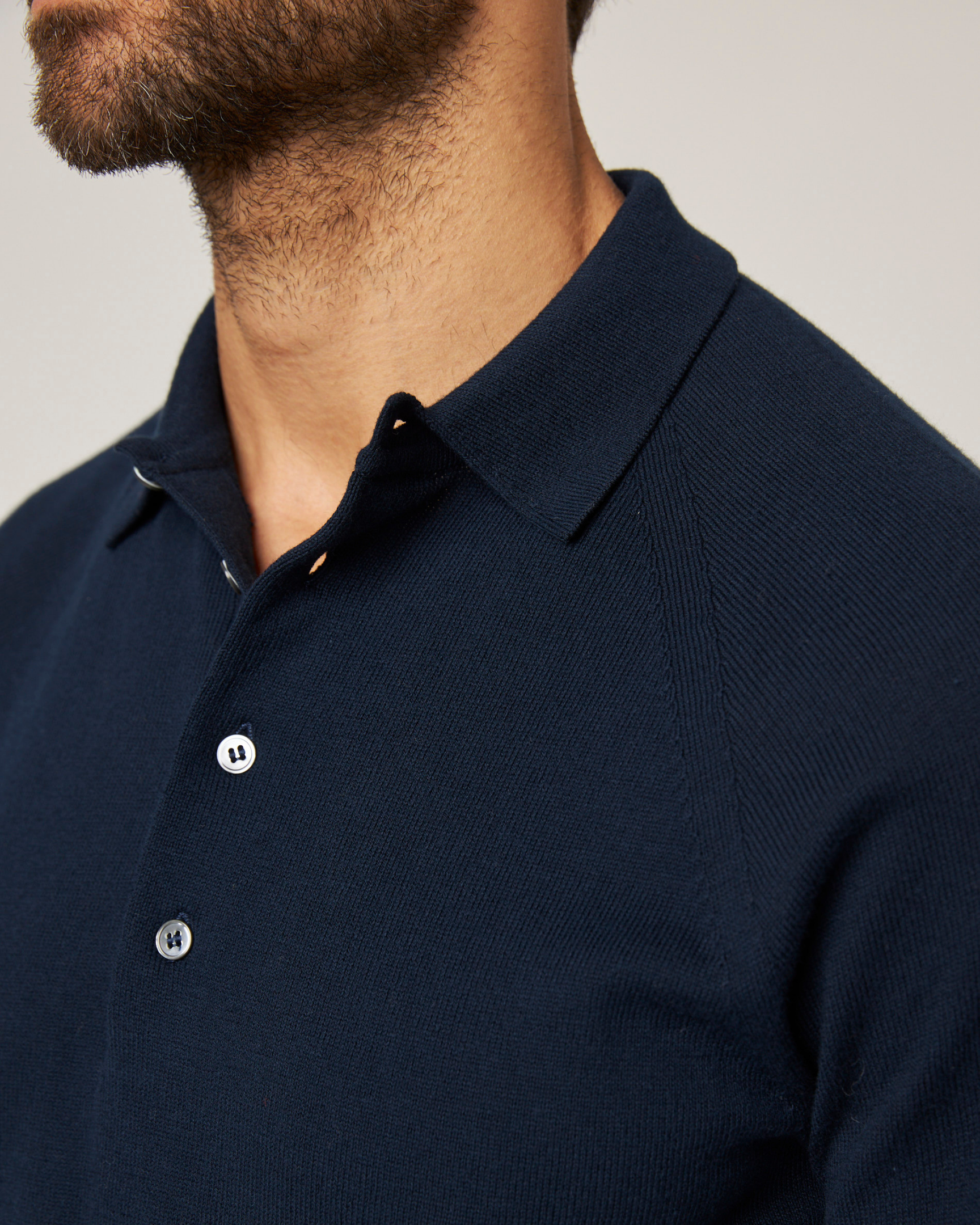 Image of model wearing Jones Polo Shirt 2.0. 