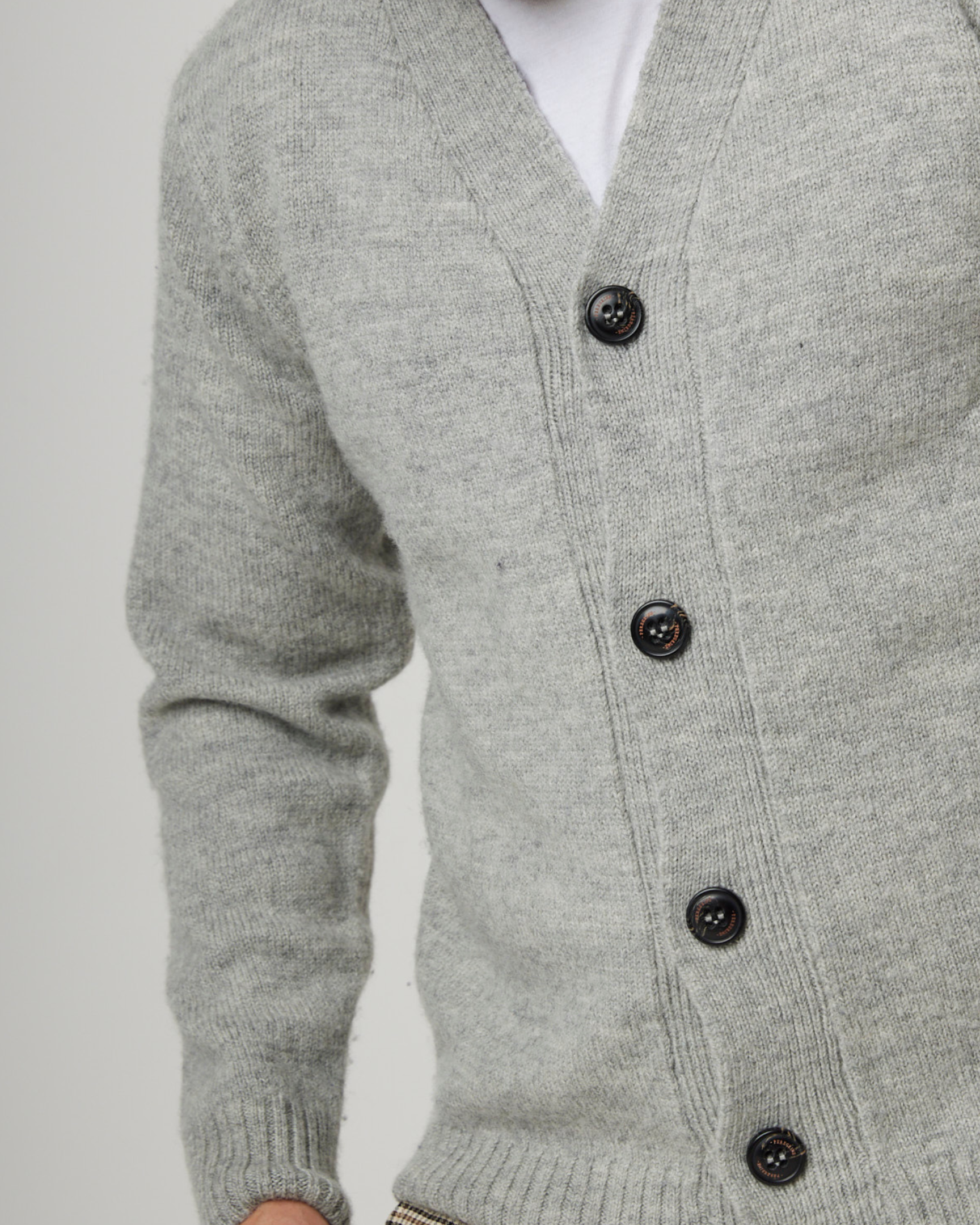 Image of model wearing Makers Cardigan. 