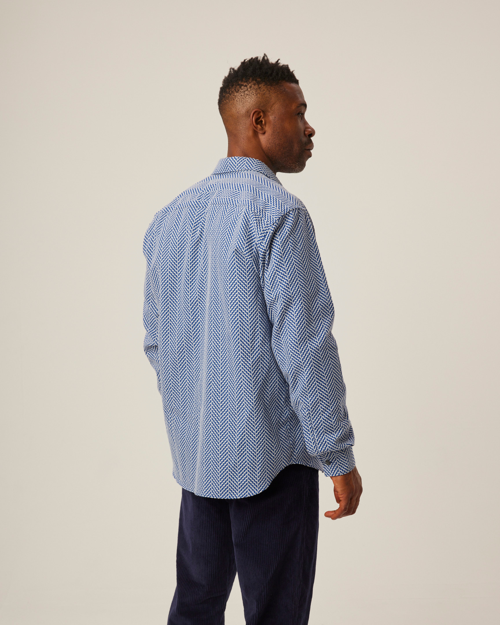 Image of model wearing Club Shirt. 