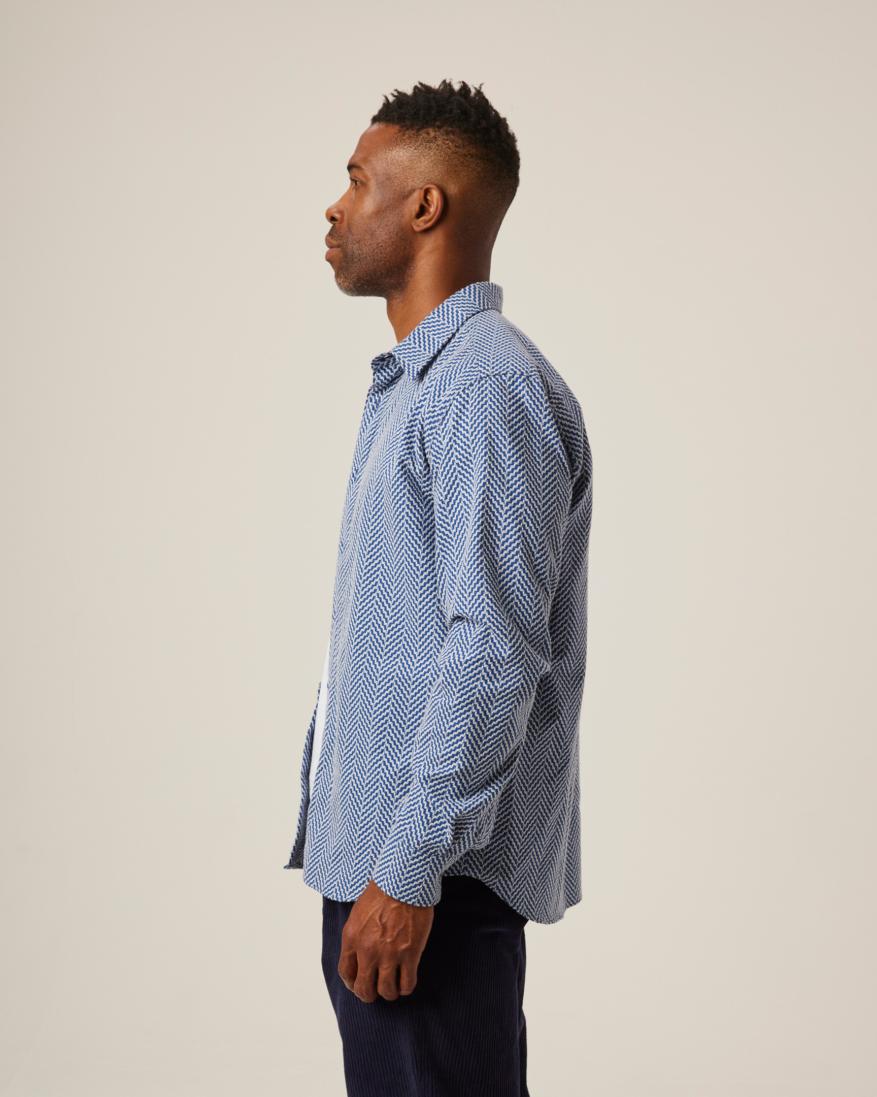 Image of model wearing Club Shirt. 