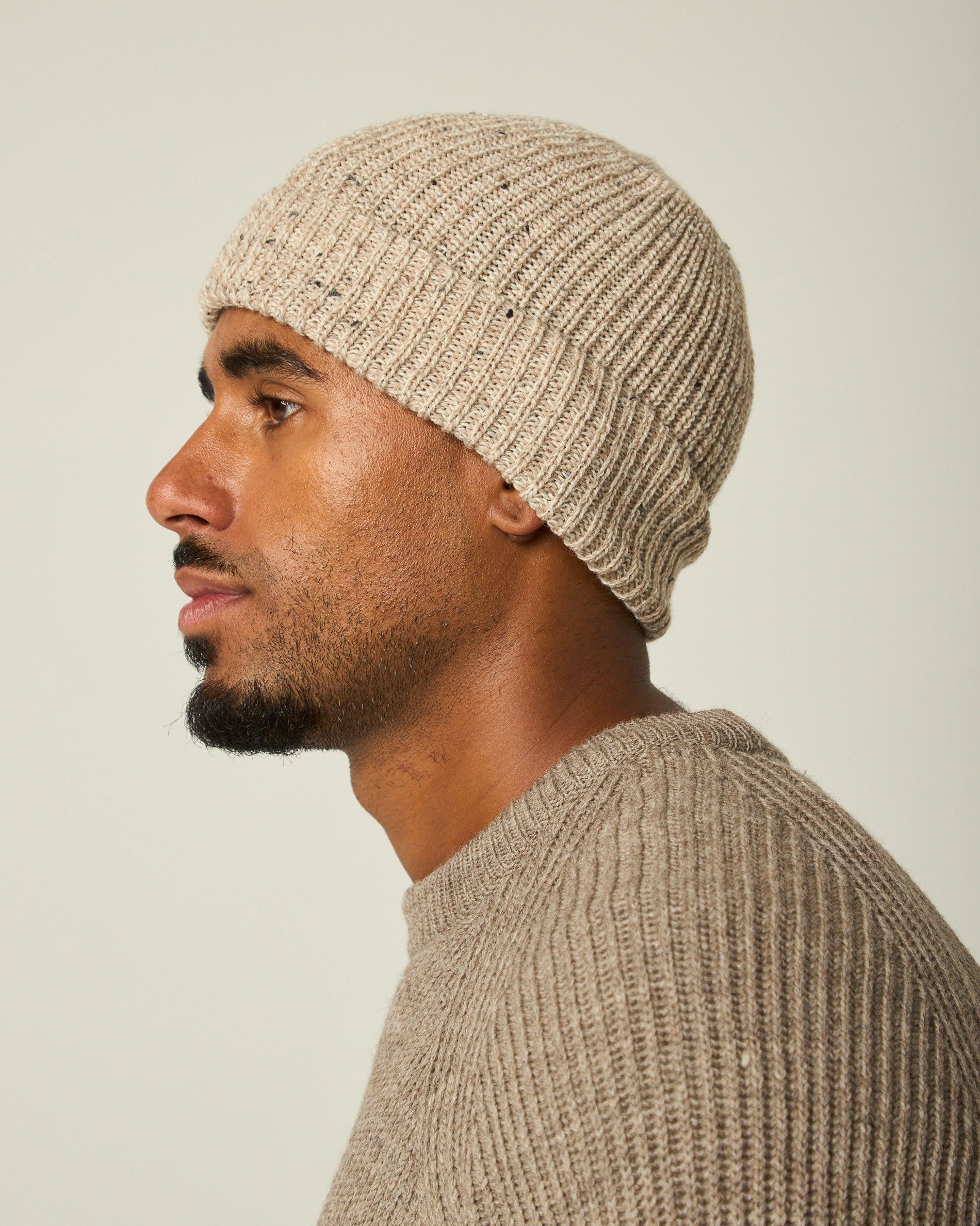 Image of model wearing Porter Ribbed Beanie. One Size 