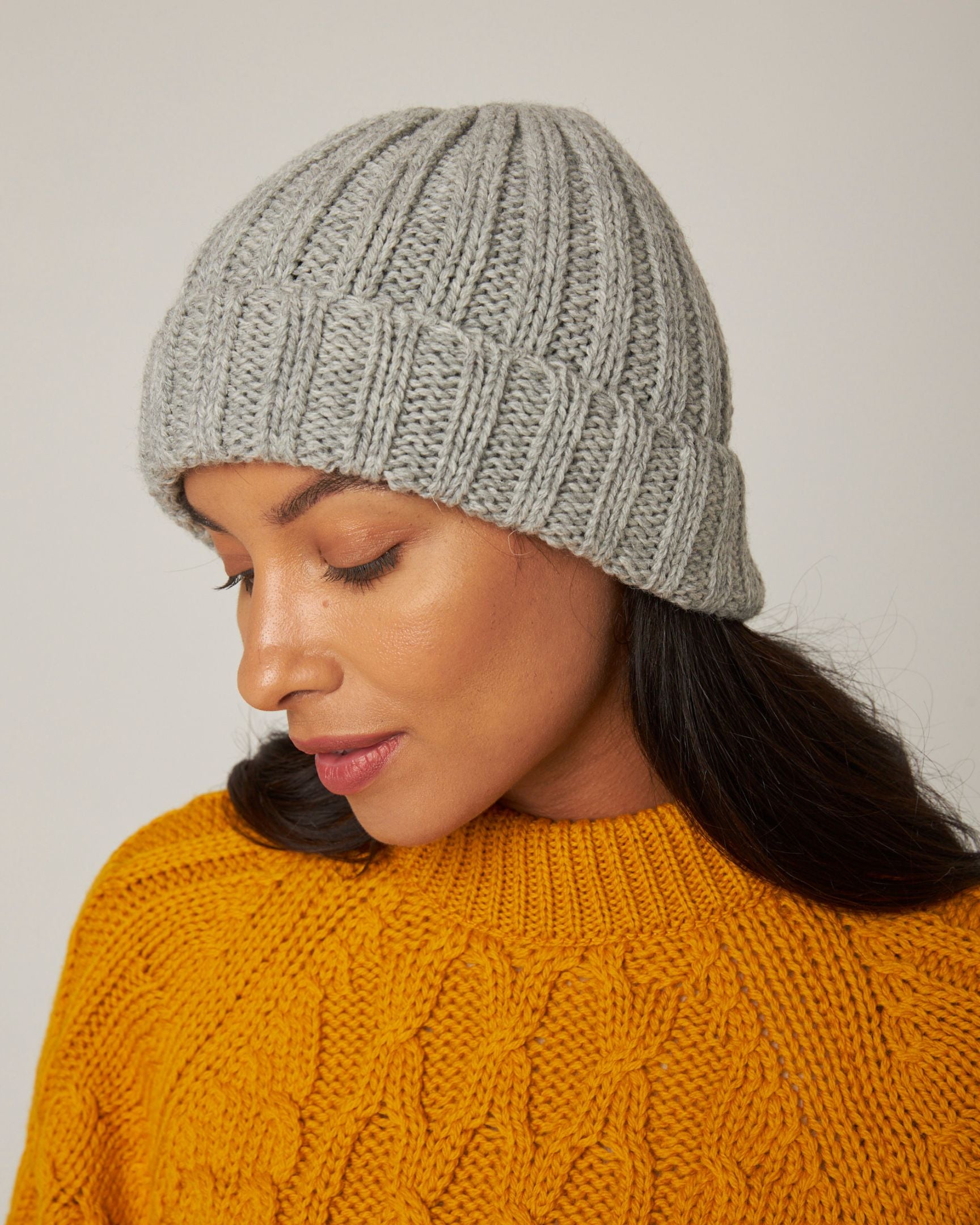 Image of model wearing Milliner Ribbed Beanie. One Size