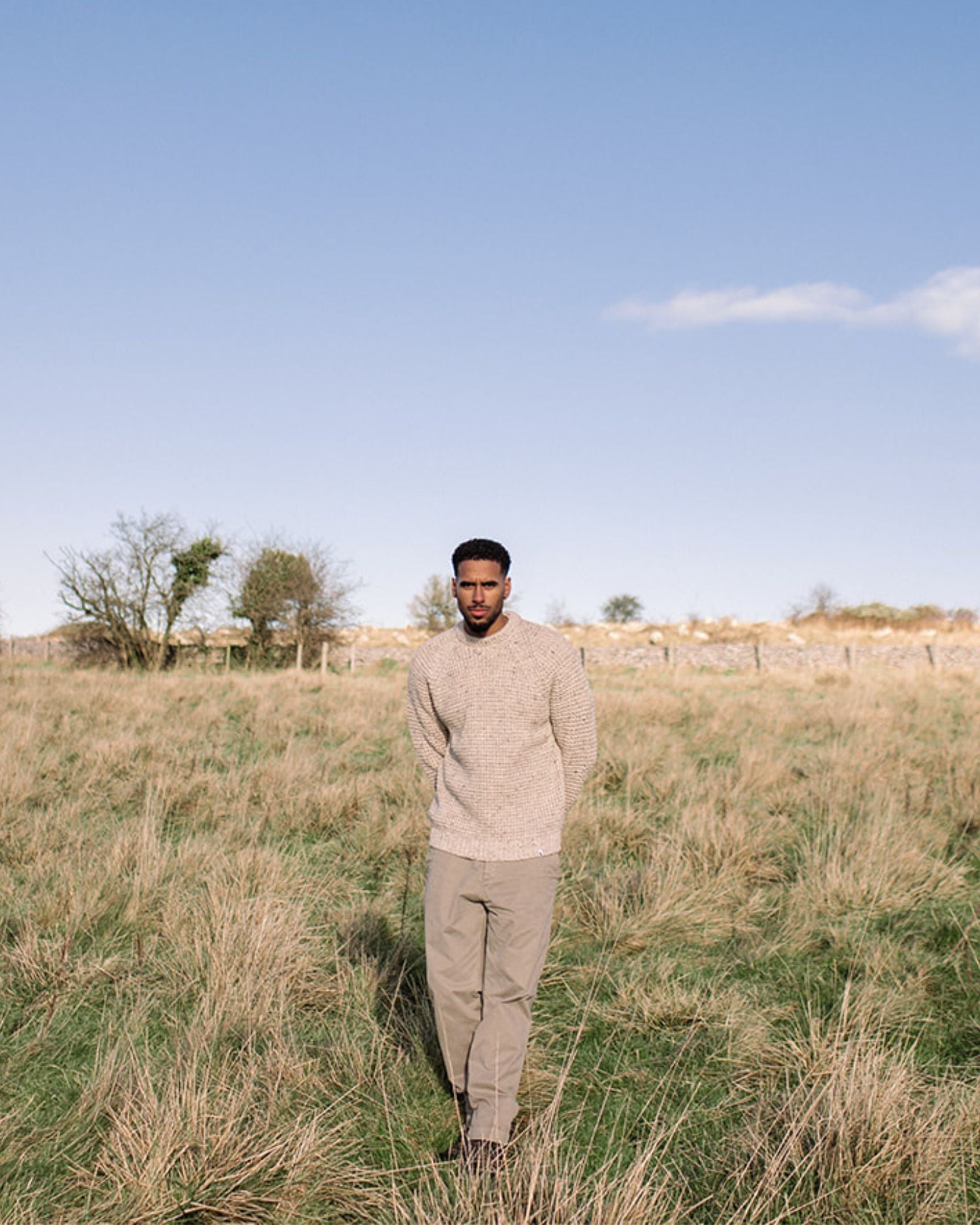 Image of model wearing Waffle Crew Neck Jumper. Model is 6ft1in, chest size 38in and wearing size Medium