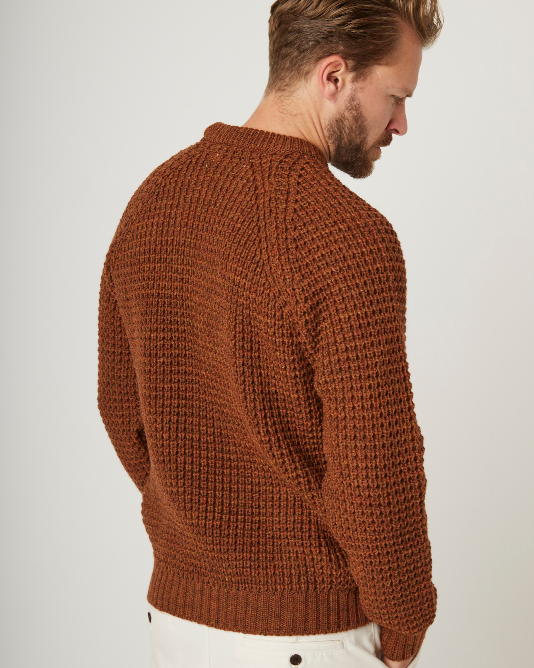 Image of model wearing Waffle Crew Neck Jumper. Model is 6ft1in, chest size 38in and wearing size Medium