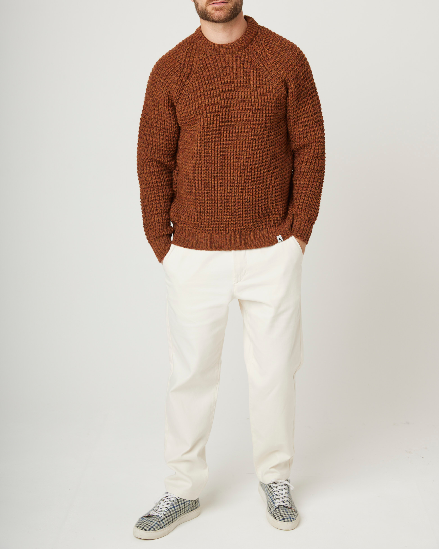 Image of model wearing Waffle Crew Neck Jumper. Model is 6ft1in, chest size 38in and wearing size Medium