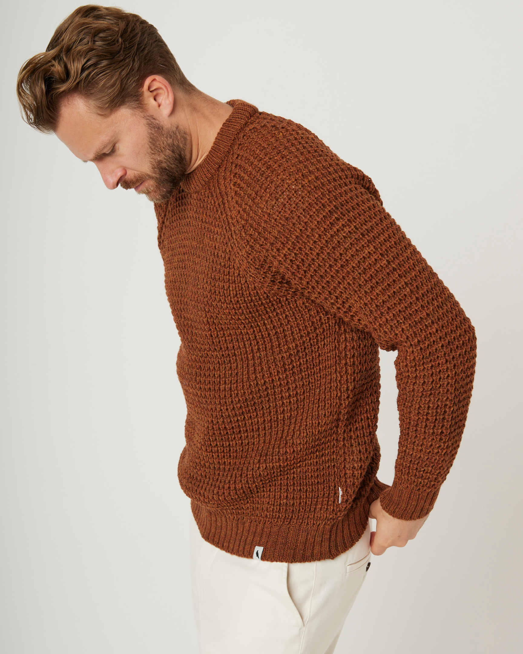 Image of model wearing Waffle Crew Neck Jumper. Model is 6ft1in, chest size 38in and wearing size Medium