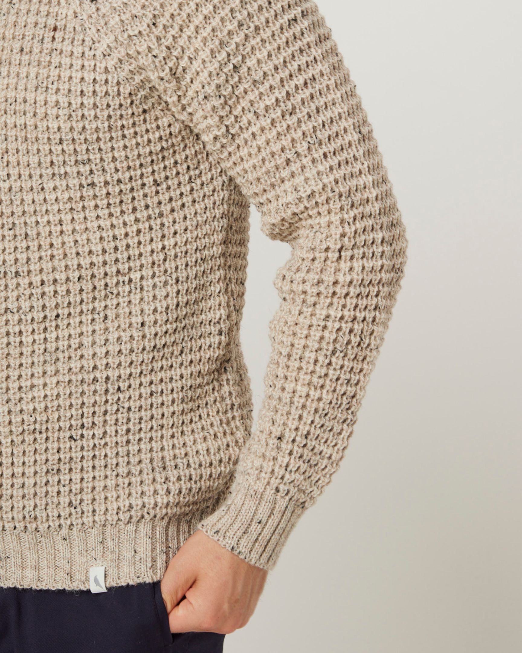 Image of model wearing Waffle Crew Neck Jumper. Model is 6ft1in, chest size 38in and wearing size Medium