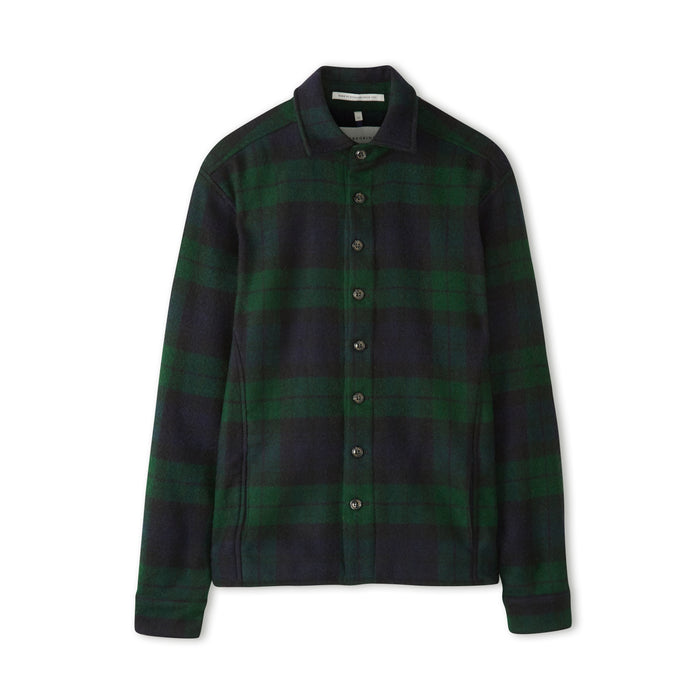Flatlay image of a checked wool collared shirt with eight black buttons fastening down the front center of the shirt, it is a checked pattern consisting of navy and a dark forest green.